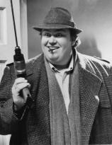 John Candy as Uncle Buck