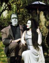 Herman and Lilly Munster in the park