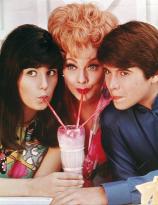 Lucille Ball with her children Lucie Arnaz and Desi Arnaz Jr. For a publicity shot for their then, television comedy sitcom, Heres Lucy