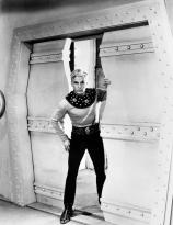 Larry Buster Crabbe as Flash Gordon