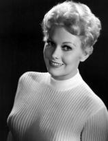Kim Novak in a white sweater