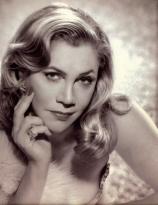 Kathleen Turner strikes a pose