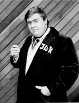 John Candy as Johnny LaRue
