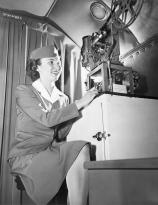 Stewardess Isle Berger shows the first full length sound movie on a transatlantic flight - PanAm 1945
