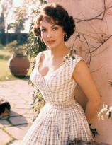Gina Lollobrigida in a garden