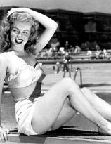 A young Marilyn Monroe by the pool