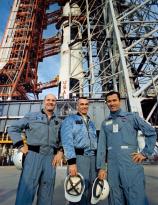 The crew of Apollo 10 in front of their ride