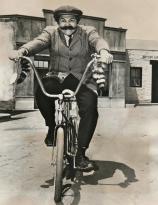Avery Schreiber rides a bike