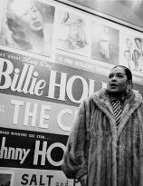 Billie Holiday arriving backstage at the Apollo Theater in Harlem, New York, circa 1952